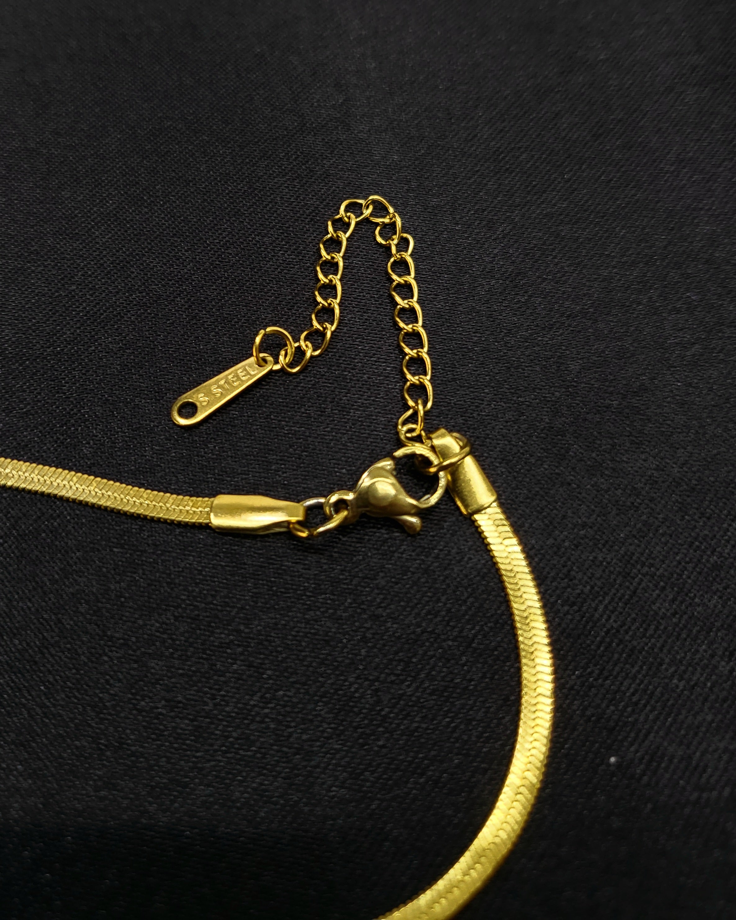 Celene Bow Necklace in 18KT Stainless Steel Gold Plating | Flat Chain with Signature Knot